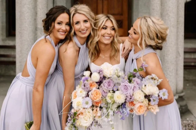 “Whispers of Wisteria & Petals of Pastel”

Our luxe multiway dresses in dreamy wisteria are perfect for every bridesmaid’s style — elegant, effortless, and endlessly versatile. Paired with soft pastel florals, this look is made for romantic ‘I do’ moments.
⠀
Which way would you wear it?
⠀
#BridesmaidGoals #WisteriaDreams #MultiwayDresses #BridalInspo #PastelWedding #BridesmaidStyle #LuxeBridal #RomanticWeddings #katesdresses
